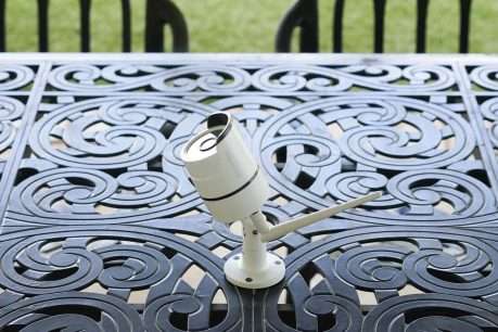 Vimtag outdoor camera displayed on patio table